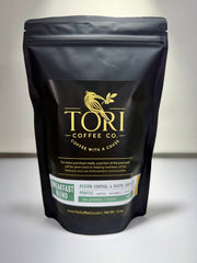 Black coffee bag with 'Tori Coffee Co.' branding on a white background