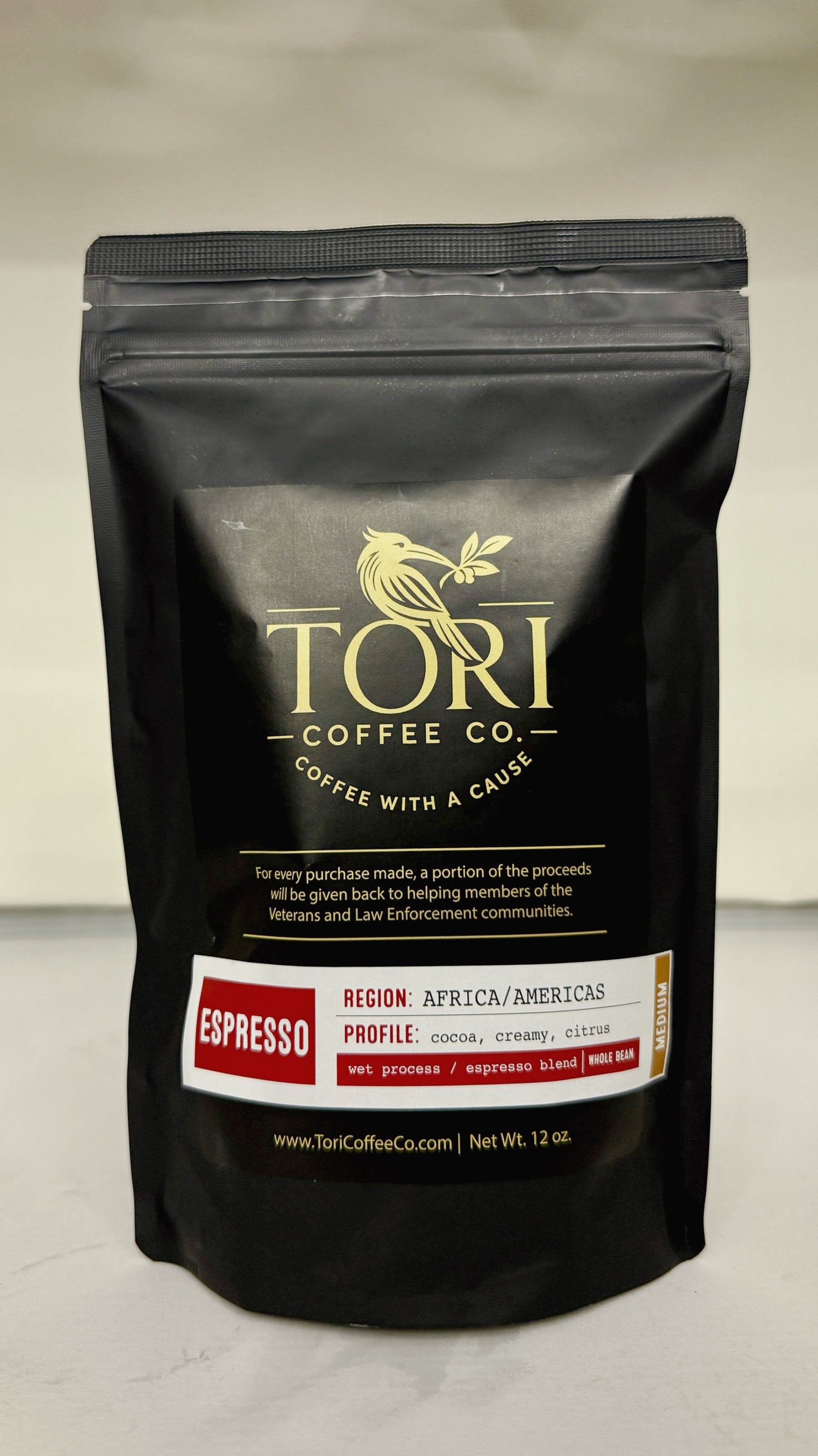 Black Tori Coffee Co. coffee bag with branding and product details on a neutral background