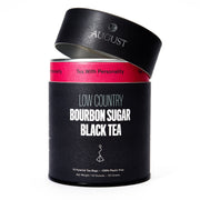 Black tea canister with 'August' branding on a white background