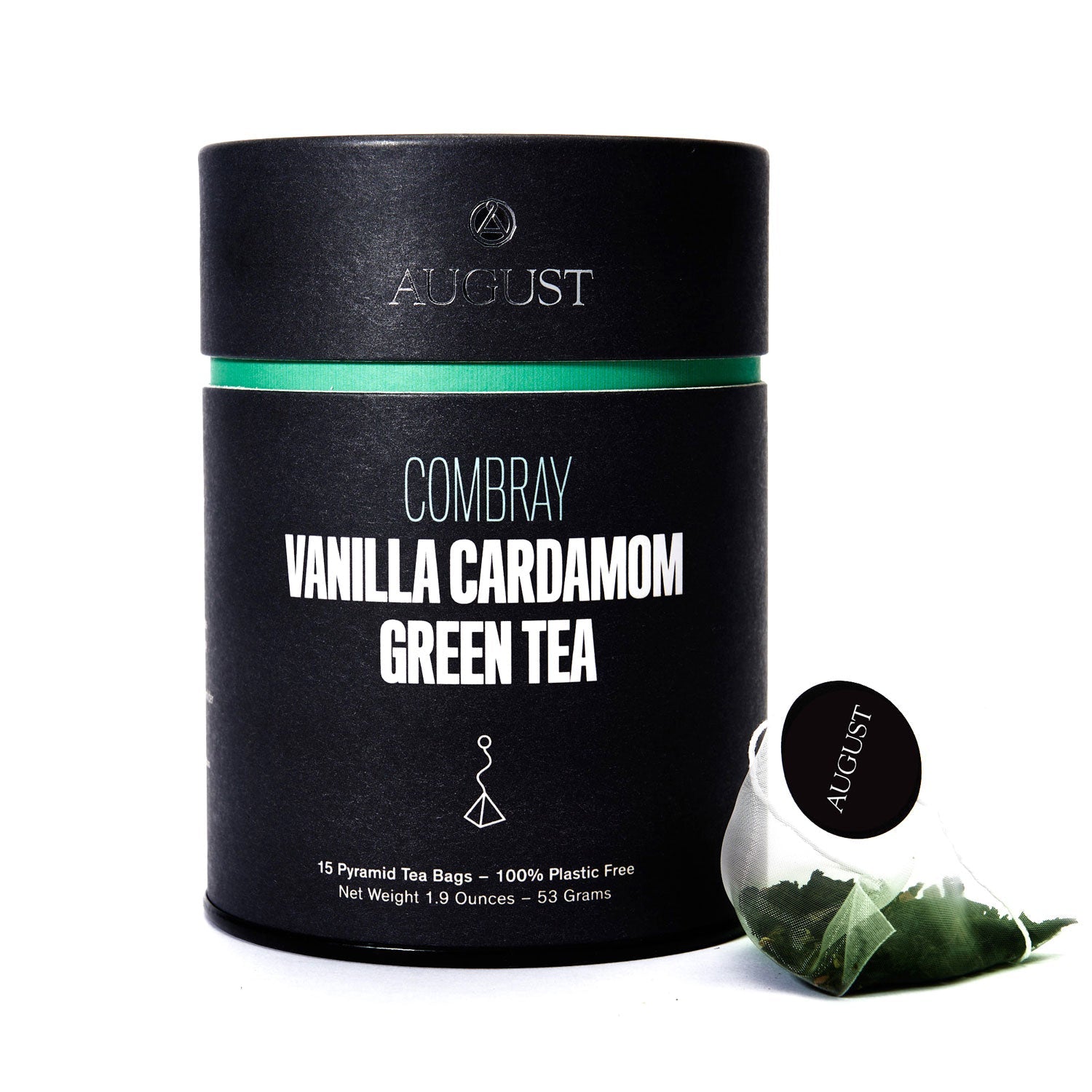 Black cylindrical container of Combray Vanilla Cardamom Green Tea with a tea bag on a white background