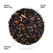Tea blend with Assam Black Tea, Cacao Shell, and Caraway Seed labeled on a white background