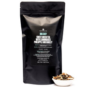 Black tea packaging with product details on a white background