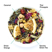 Tea blend with labeled ingredients including caramel, Thai pineapple, dried orange, and sencha green tea.