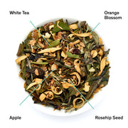 Tea blend with labeled ingredients including White Tea, Orange Blossom, Apple, and Rosehip Seed.