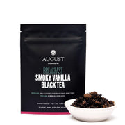 August Tea package for 'Breakfast Smoky Vanilla Black Tea' with a bowl of tea leaves on a white background