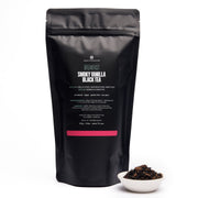 Black tea packaging with smoky vanilla black tea flavor on a white background