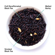  bowl of black tea with labels for Co2 Decaffeinated Black Tea, Malted Barley, and Smoked Black Tea
