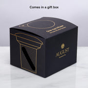 Black gift box with gold text and 'August' branding on a white background