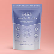 Package of 'a dash' Lavender Matcha latte powder on a pink background