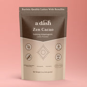 Package of 'a dash Zen Cacao' latte powder on a pink background