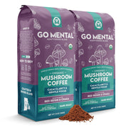 Two packages of Go Mental Organic Mushroom Coffee on a white background