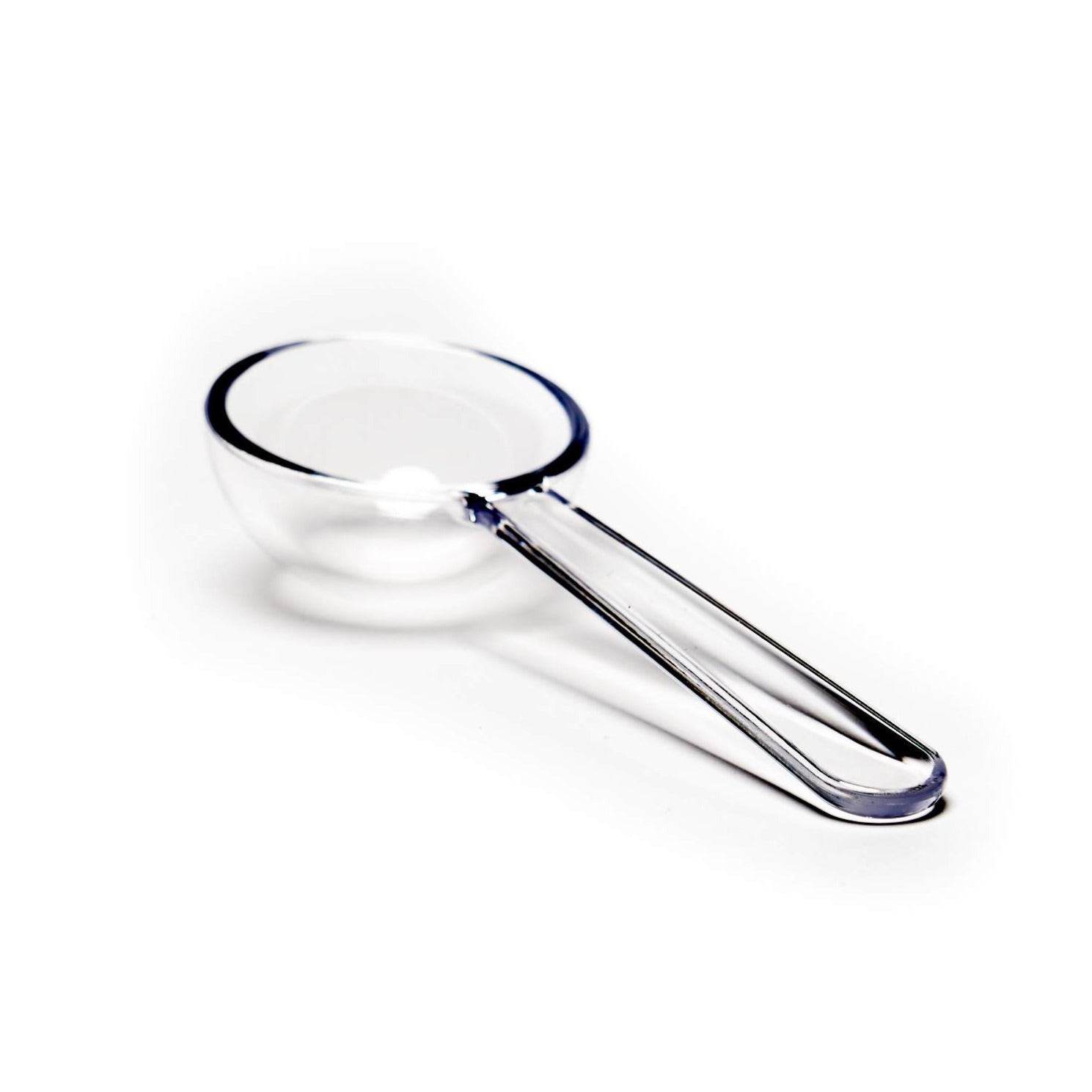 Clear magnifying glass on a white background